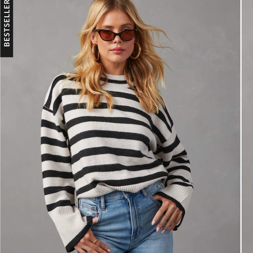 i’m selling the don’t mind me striped knit sweater from vici.